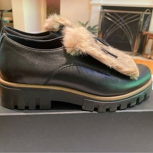 Oxfords , lace-up and faux fur shoe.Leather upper/synthetic sole. Made in Italy.